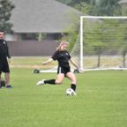 Kira Pevow showing perfect form on the soccer field.