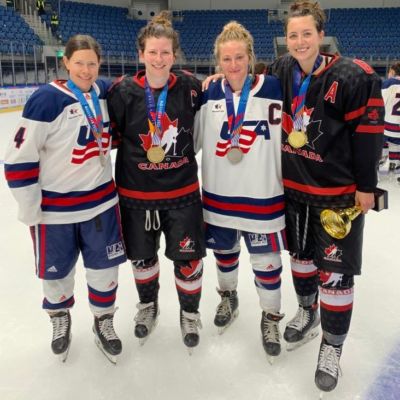 Goldberg USA Captain with captains from Team Canada and the women that helped put Team Canada together
