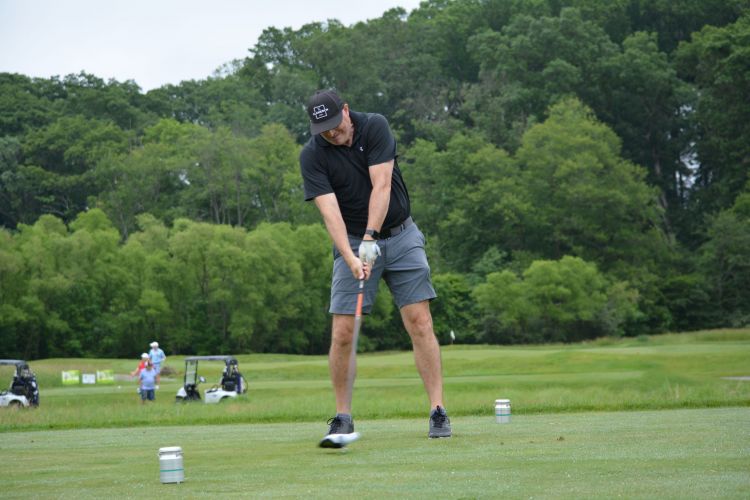DSC_0397 Guy Tees off