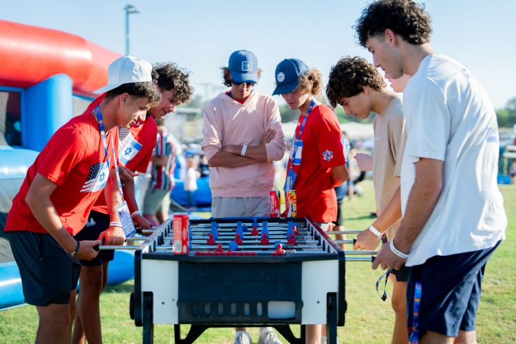 Day of Hope Party Kids play foosball DSC03984