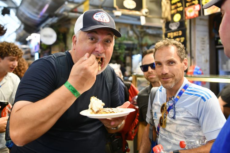 Great shot MUSA guy stuffing face with food at Shuk Mahane Yehuda DSC_7977