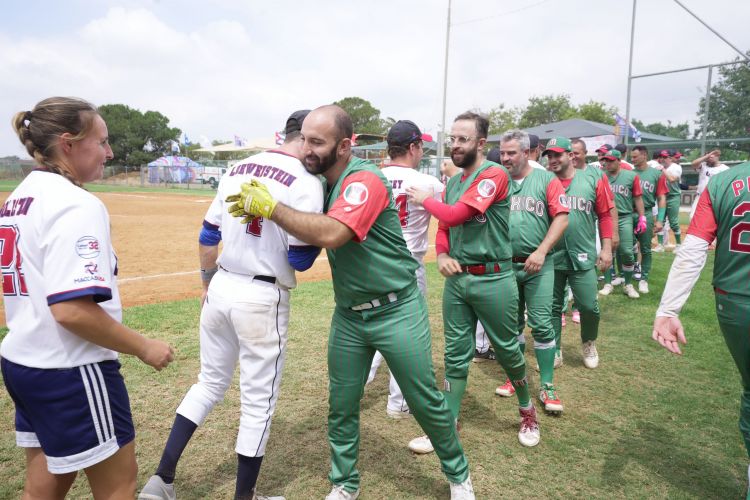 USA softball team hugging team Mexico in Fred Cohen jerseys DSC04314